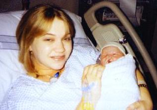 Momma showing off pride and joy