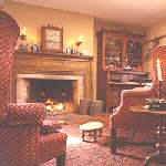 chairs beside fireplace