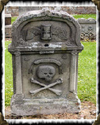 headstone with skull and crossbones