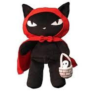 cat doll with red cape