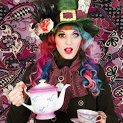 woman in hat with teapot