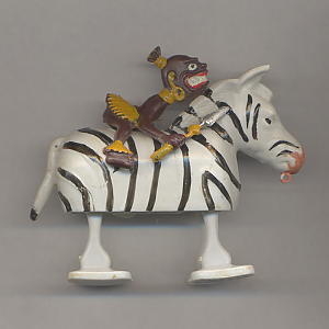 Zebra and Native with dagger and spear Rider