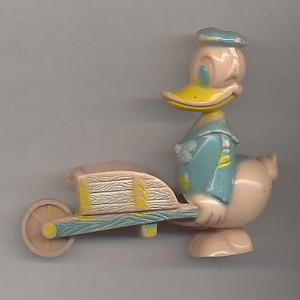 Donald Duck pushing wheelbarrow