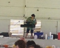 Anne playing music at family reunion