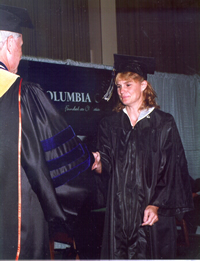 Mary receiving diploma