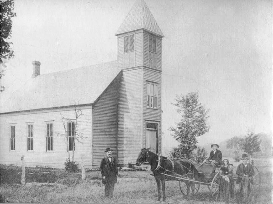 James Stanley and wife in a wagon