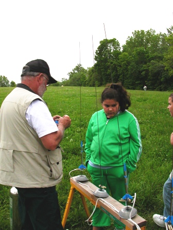 Randall assists students at the pads