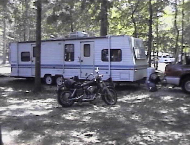 this is the camper we stayed(i was forced to sleep in the tent in sub-zero temperatures) in and in front of that is my father's cycle