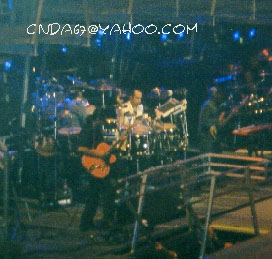 AJ pounds away on the drums.  (Brian also picked up a guitar at the show.)