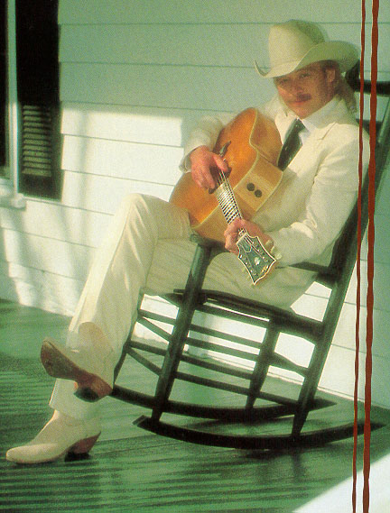 Alan Jackson sitting in rocker