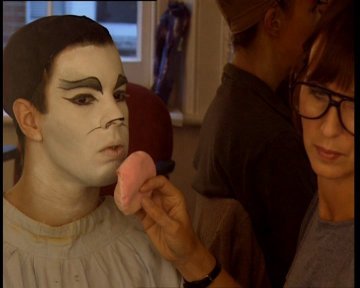 Jacob putting on his Mistoffelees makeup