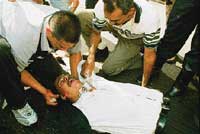 Foto ANTONIO RODRíGUEZ. Jorge Torotoza, reportero gráfico del diario 2001, fue herido de un disparo en la cabeza por los francotiradores apostados en Capitolio