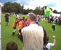 HarboroughCarnivalShowgroundFootballMatchWinnersCelebrating.JPG
