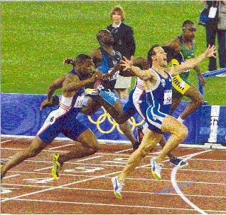 Heather Jones watches closely the men's 200m final