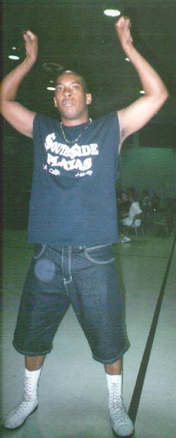 L.A. Ca$h throws up the Playas salute after a victory in Graham's CWF