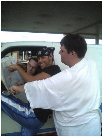 The boys trying to plan our route