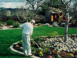 One of his loves,making the yard look beautiful