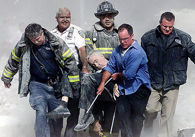 Rescuers carrying man