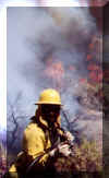 Kirby Stone on the Double H complex in 2000.  This photo was taken at about 0600, note the fire behavior.