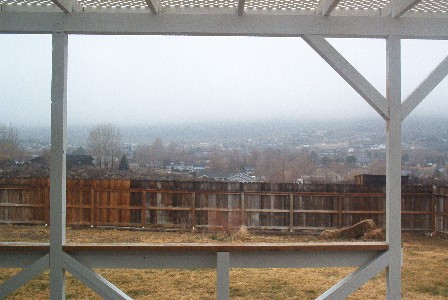 The Sierras behind my house fogged in by some amazing clouds