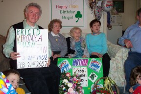 Denis holding display re: Brigid's day