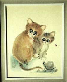 2 cats looking at snail