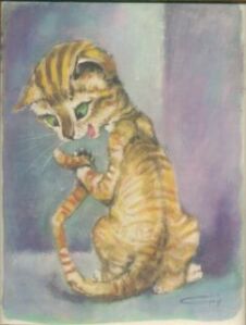 Cat looking at it's tail