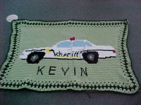 Linda Gelb's completed sheriff's patrol car afghan