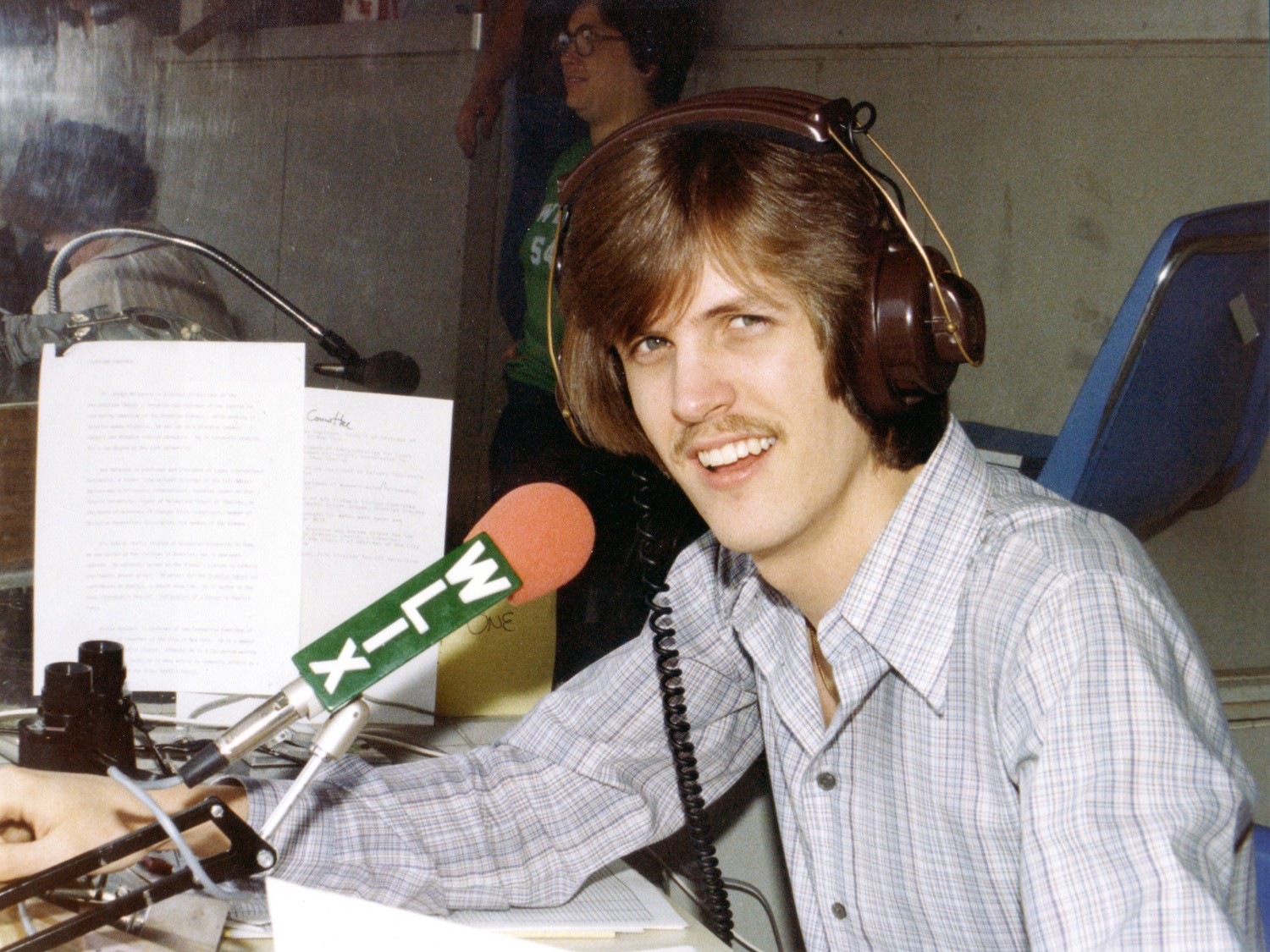 Founding Christian 54 Program Director Lloyd Parker at the mike in 1979.