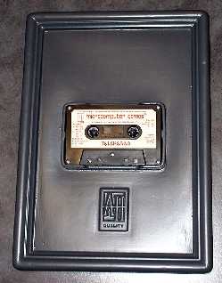 Cassette in plastic tray