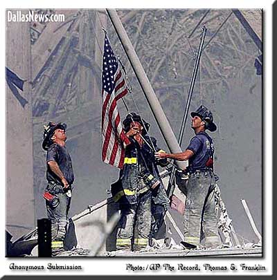 Firemen Raising The Flag
