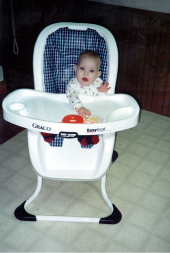 Sitting in the highchair