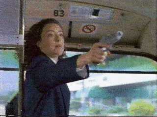 Molly pointing the gun.  Oh she's so mean :)