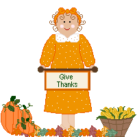 Girl holding sign that says Give Thanks