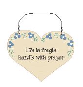 Heart shaped sign says,