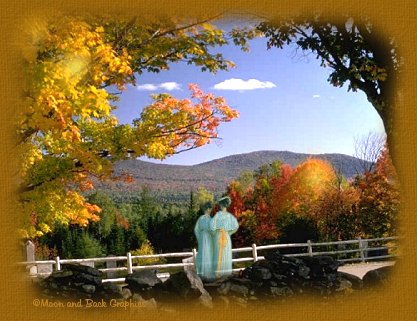 Ladies observe beautiful fall trees and mountains