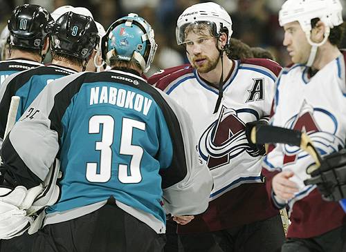 Wait till next year
Avs star Peter Forsberg, who scored the game's only goal, shakes hands with Sharks goalie Evgeni Nabokov. (Brian Bahr/Getty Images). 2002-04-15