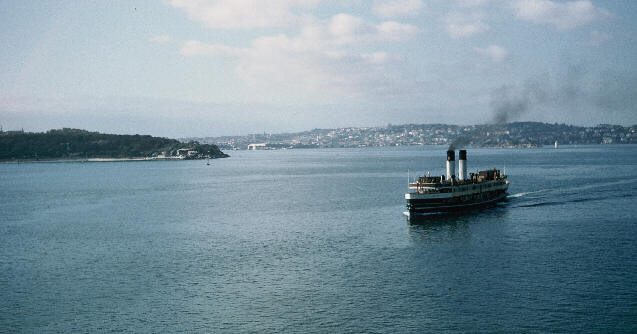 Passing a Manly ferry in Sydney Harbour.