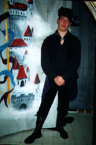 Father Damon poses at the Gathering of Fools, 2002