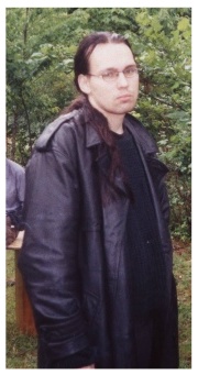 Jeremiah looks sad..it's raining and there's cow poop.