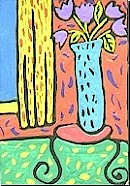 tulips in tall vase