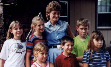 Kathy with grandkids