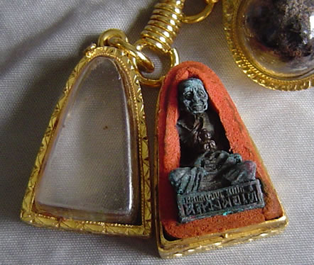 lp tae with a guman small statue