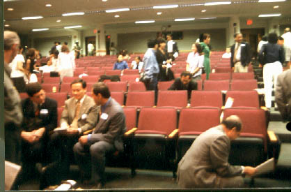   Bill's language lesson:  
  "Sabaidee, Ajarn Prany."  
  "Oy, baw mee yung dock."  
  "Poam baw tun cow teua."  
  "Oy, kop jai lye lye."  
  "Soak-dee, SJD4DC."  
  "Huck pang, Lisa!"