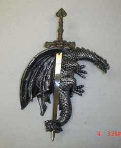 Dragon holding sword 