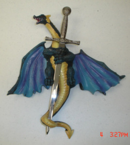 Dragon Holding sword-front blue wings 