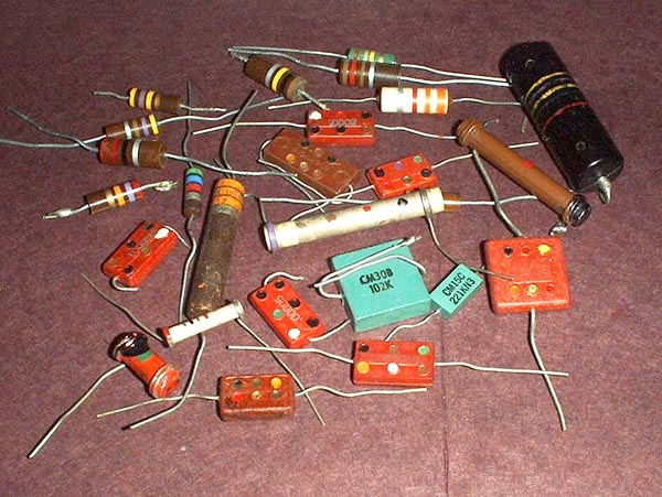 Photo of assorted resistors and capacitors.