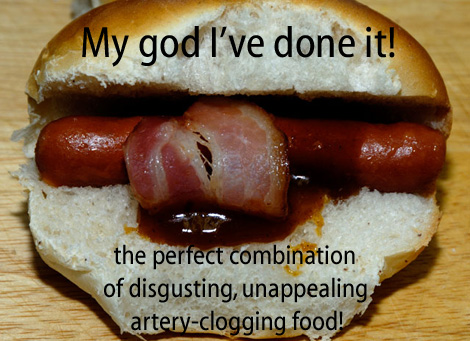 [Hot dog wrapped in bacon with BBQ sauce in a hamburger bun] My god I've done it!  the perfect combination of disgusting, unappealing artery-clogging food!
