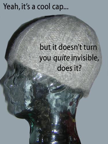 [Hat on a see-through mannequin head] Yeah, it's a cool cap... but it doesn't turn you quite invisible, does it?