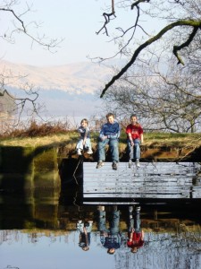 Kids playing on a bridge